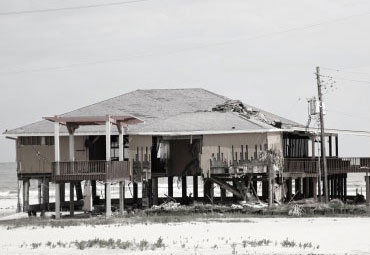 wind damage - spray foam can help prevent uplift to Homestead roofs